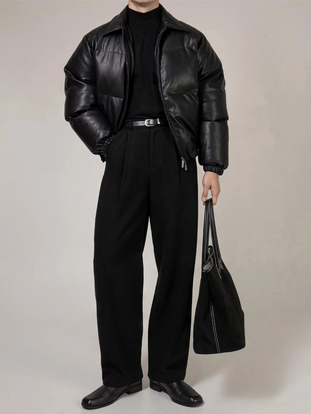 PU Leather Puffer Jacket With A Stand-up Collar And Extra Padding